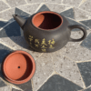 Teapots with ideograms