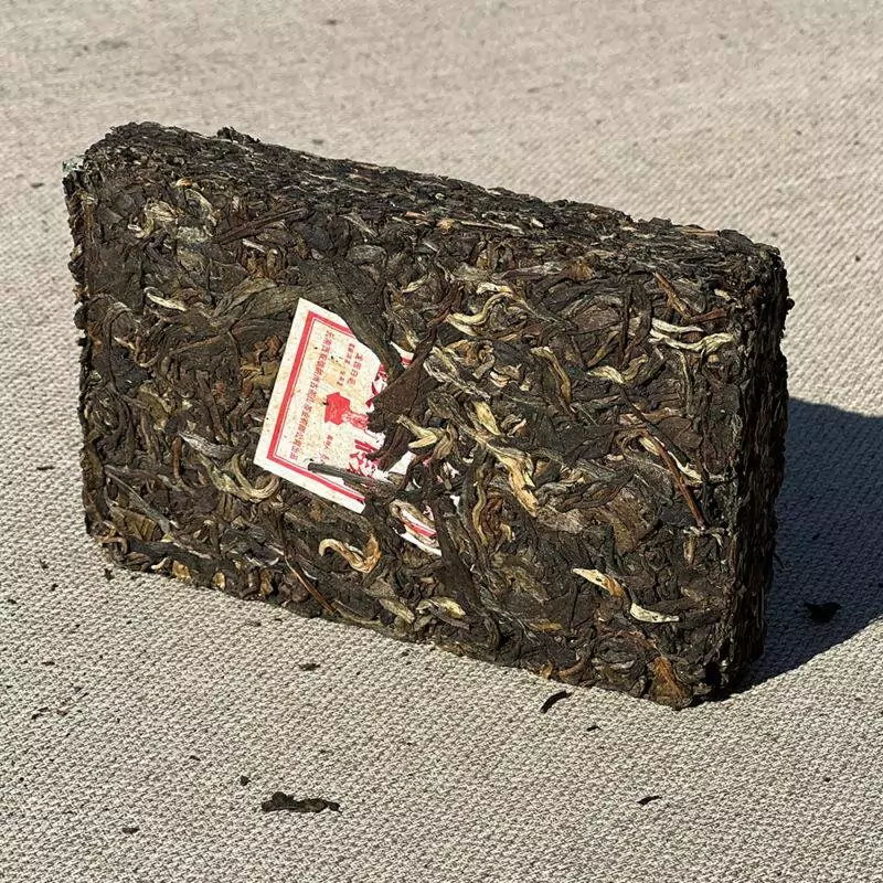 Long Yuan Bai Hao Sheng (Raw) Puer Tea Brick