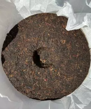 Tè Puer Shu (cotto) Menghai Gold Bud Torta