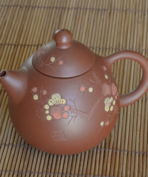 Brown Yixing clay teapot with flowers